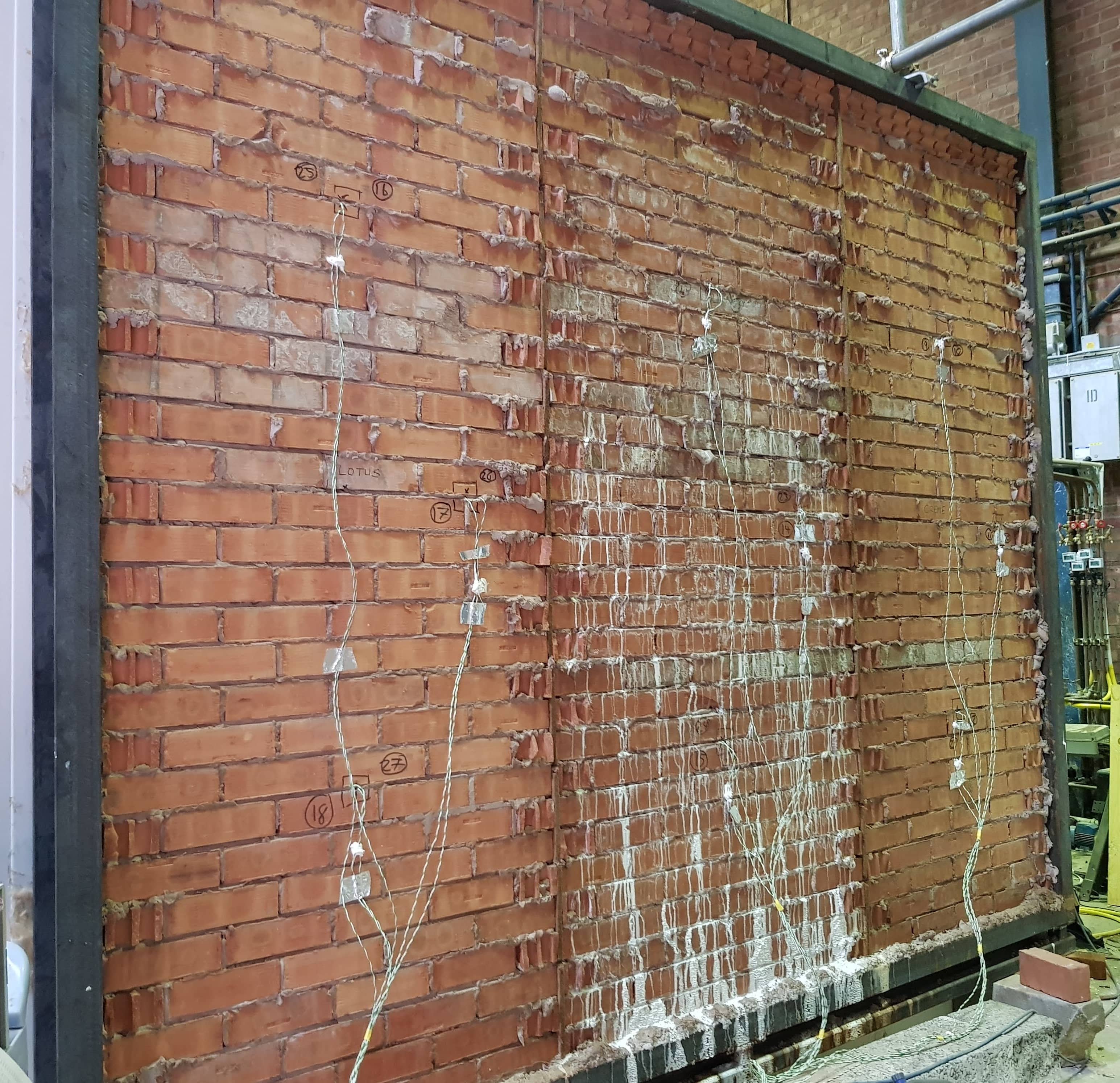 Salt efflorescence on brick wall